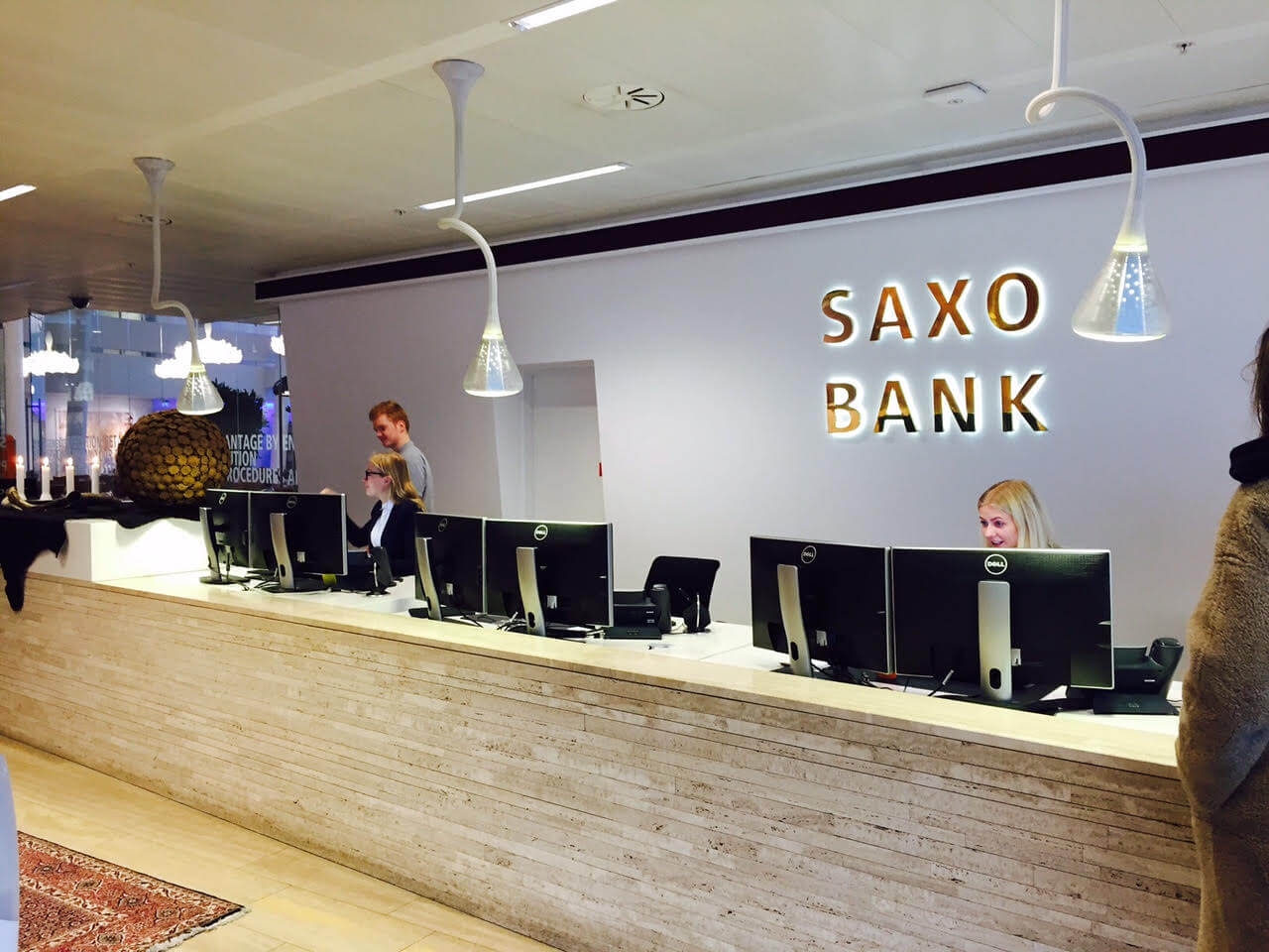 Saxo Bank onderzoekt mogelijkheden beursgang in Amsterdam