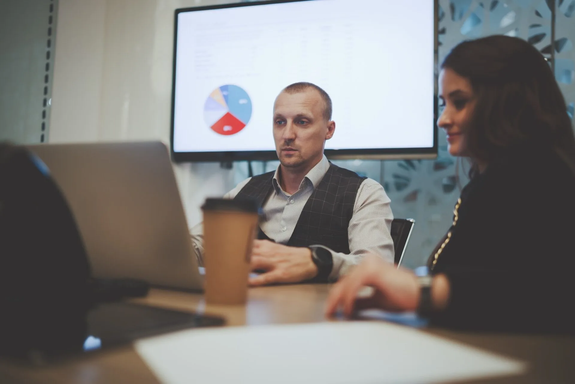 A business video call in a boardroom