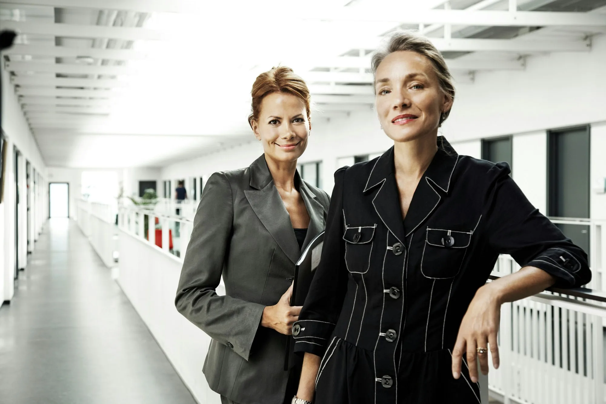 Business women smiling